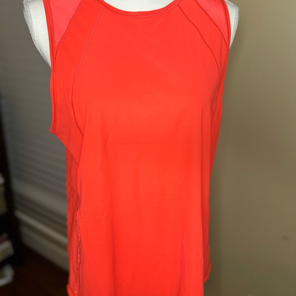 NWOT Tags Lululemon bright orange sculpt top. Size 10